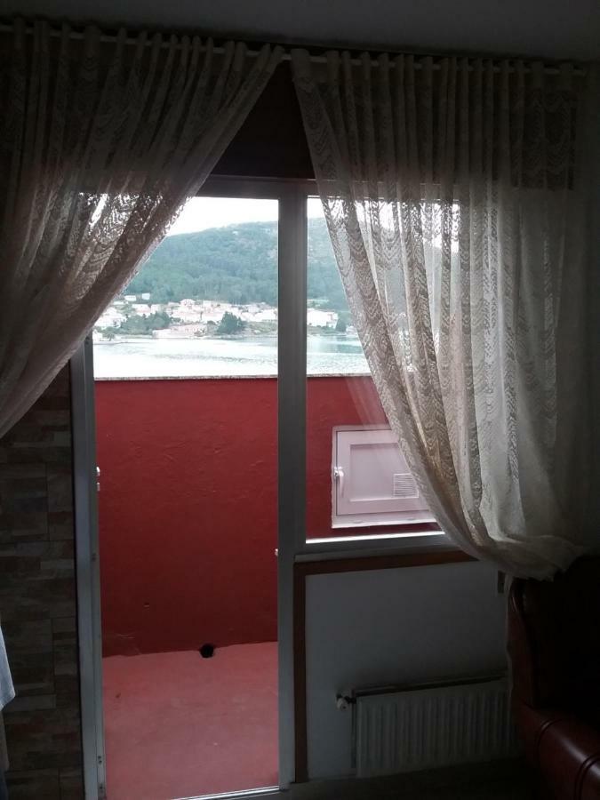 Atico Vacacional Apartment Muros Exterior photo