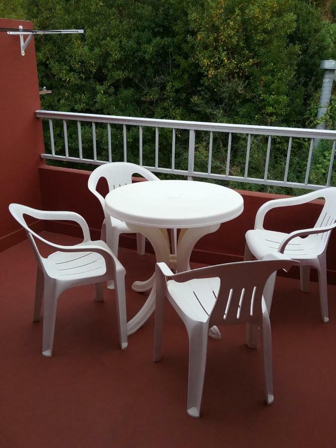 Atico Vacacional Apartment Muros Exterior photo